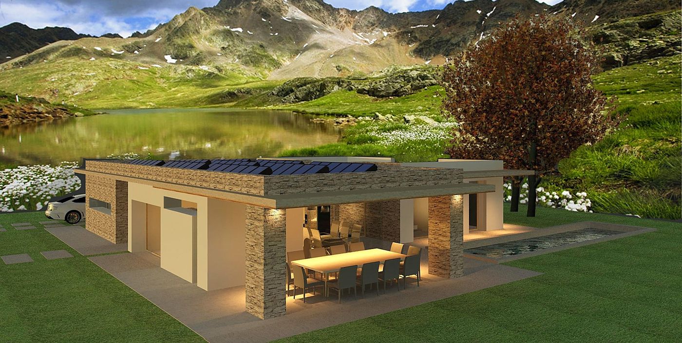 La villa di sera, con le vetrate accese e le colline sullo sfondo