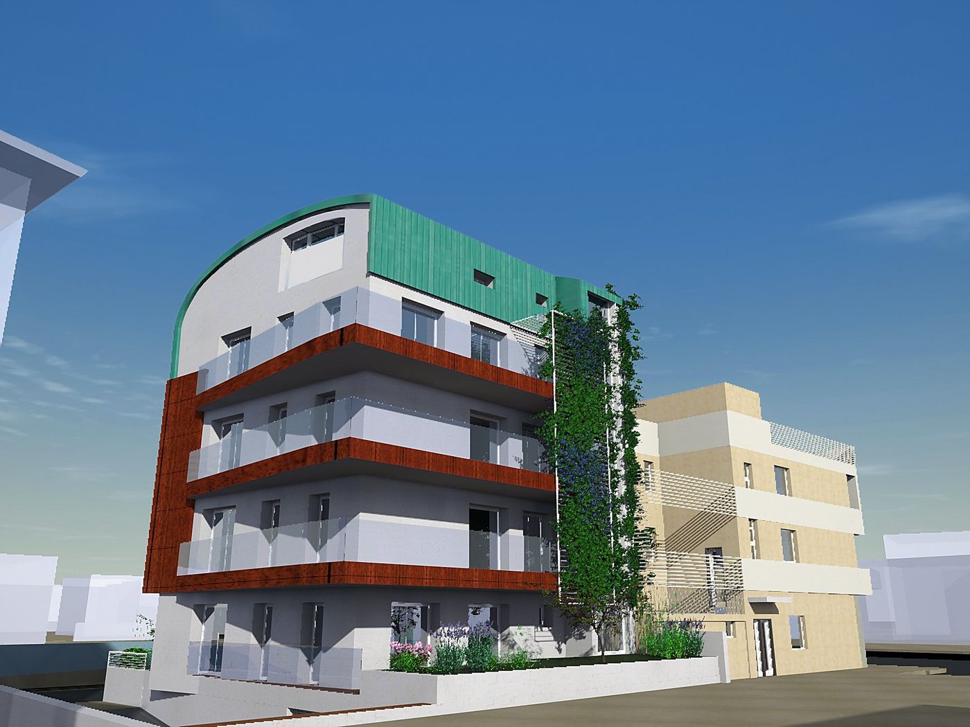 L’edificio accanto al fabbricato esistente, con la parete verde sul fianco